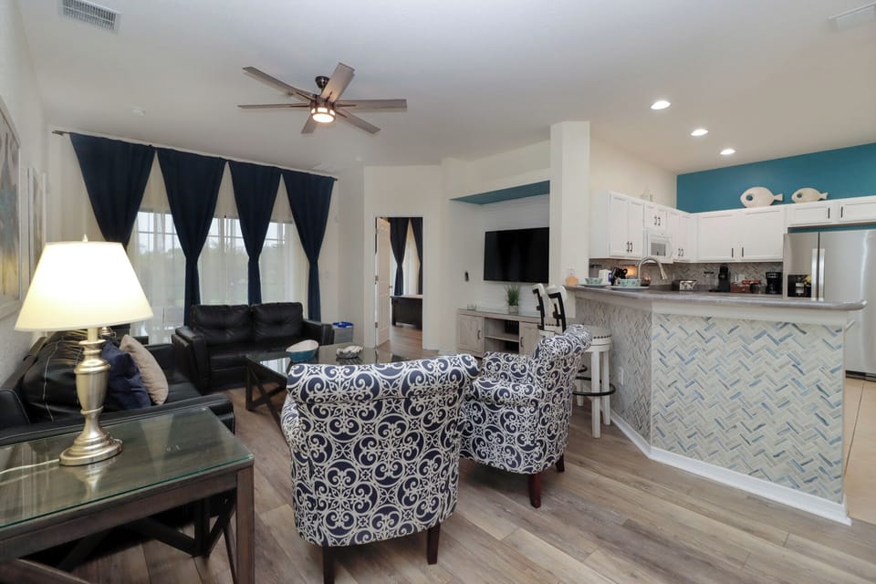The inviting layout offers plenty of space for lounging, whether you're gathering with family, enjoying a movie night, or simply unwinding after a day of adventure.