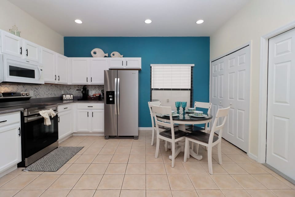 Step into this open-concept kitchen, designed for both functionality and style.