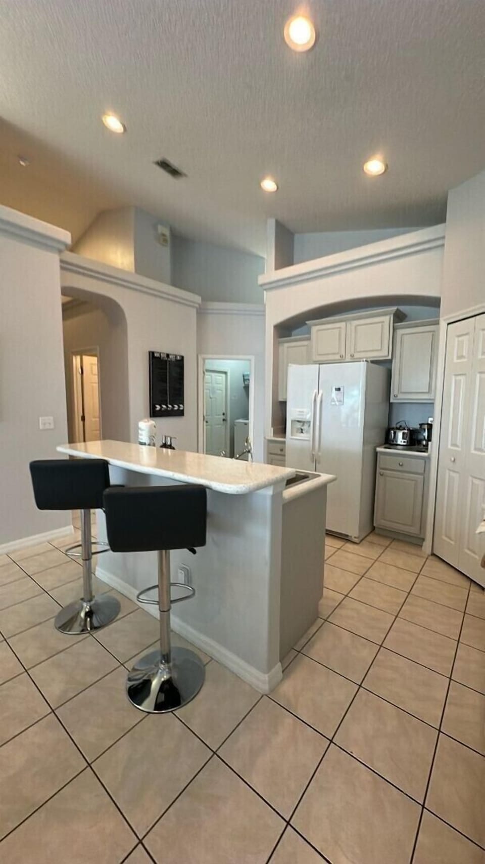 Step into the open kitchen, a bright and spacious area that serves as the heart of the home, seamlessly combining functionality with style.