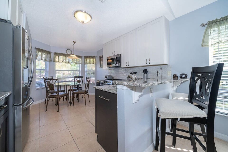 Paired with a charming kitchen nook, this space becomes the heart of the home—a place where memories are made.