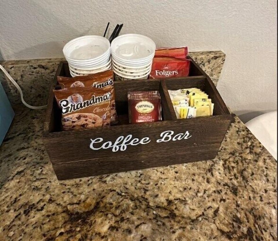 Delight in the welcoming charm of a Complimentary Coffee Bar, thoughtfully designed for your enjoyment.