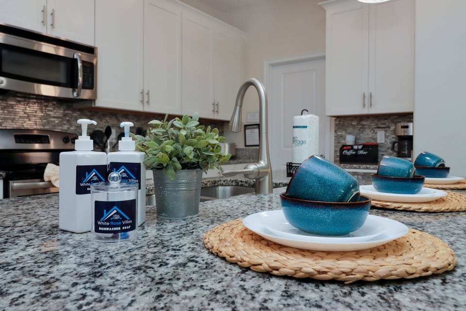 Whip up meals in style with sleek countertops, stainless steel appliances, and elegant, contemporary flair.