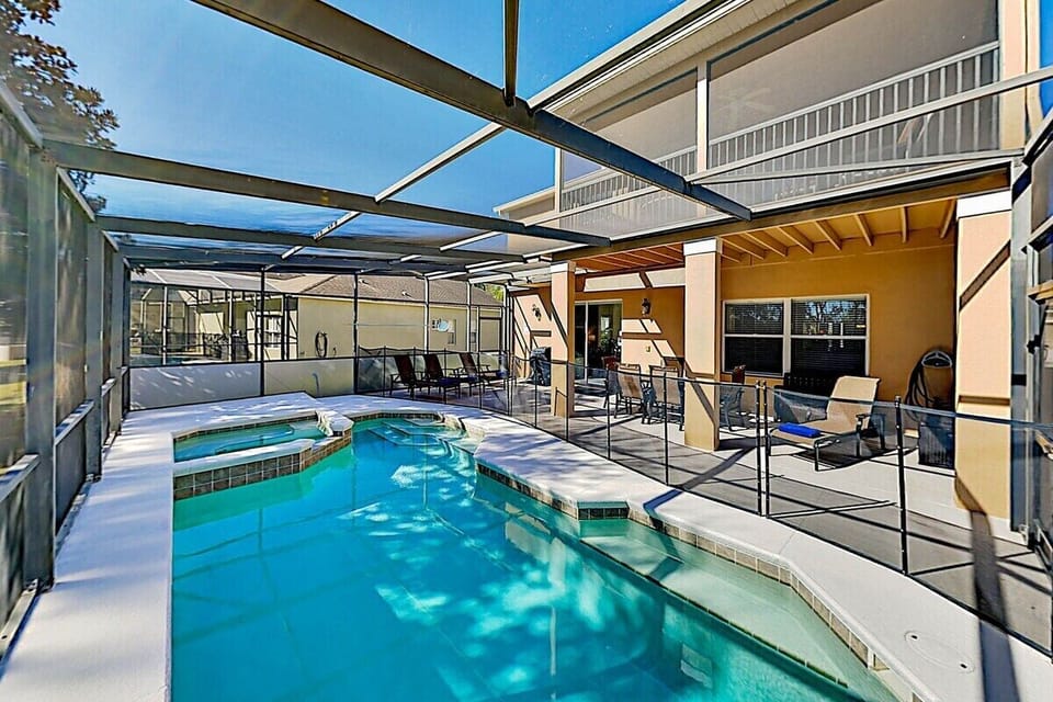Relaxing pool with spa and no rear neighbors