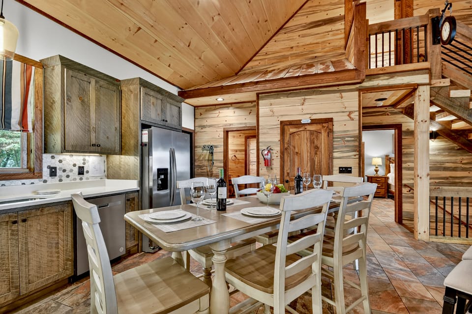 he open-concept design ensures that mealtime is always filled with conversation and connection—perfect for family vacations or romantic cabin getaways in Walnut Mountain.