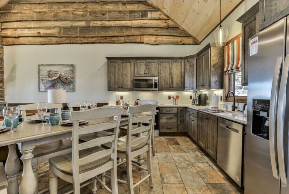 Fully stocked kitchen with stainless steel appliances and granite countertops