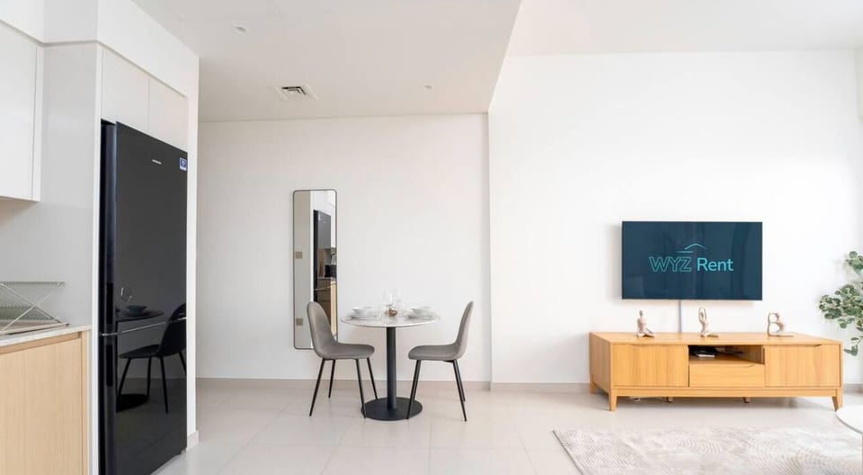 Enjoy your meals in this stylish dining area, perfect for a cozy dinner.