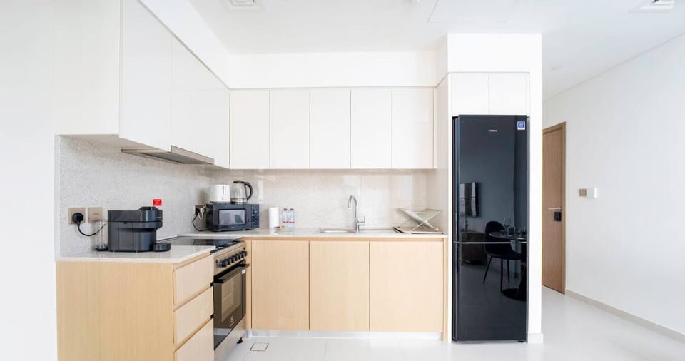 Ready to cook up a storm? This kitchen has all the tools you need, from high-end appliances to plenty of counter space.