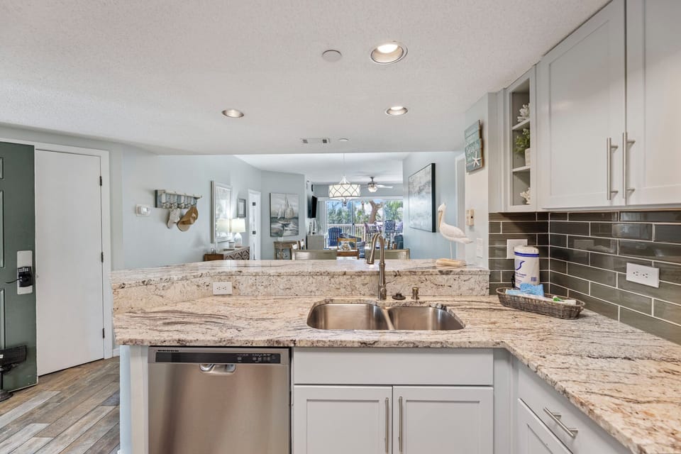 Kitchen Opens to Living Room and Dining Room