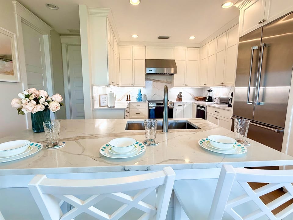 Cook, dine, and laugh together in this open, coastal kitchen  - Hosted by RentAnnaMaria 