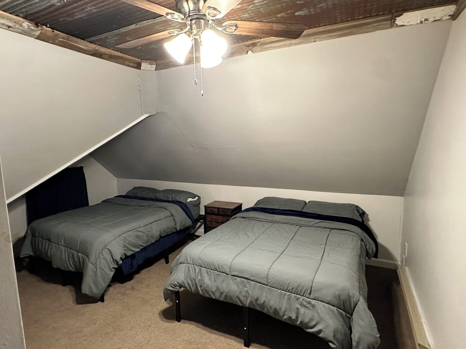 Loft bedroom with 2 full size beds
