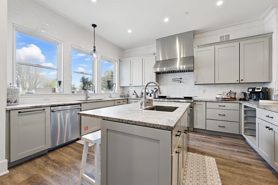 Prep island, two dishwashers, chef's range & more! 
