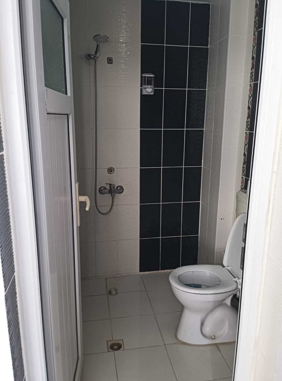 Hair dryer, slippers, towels, soap