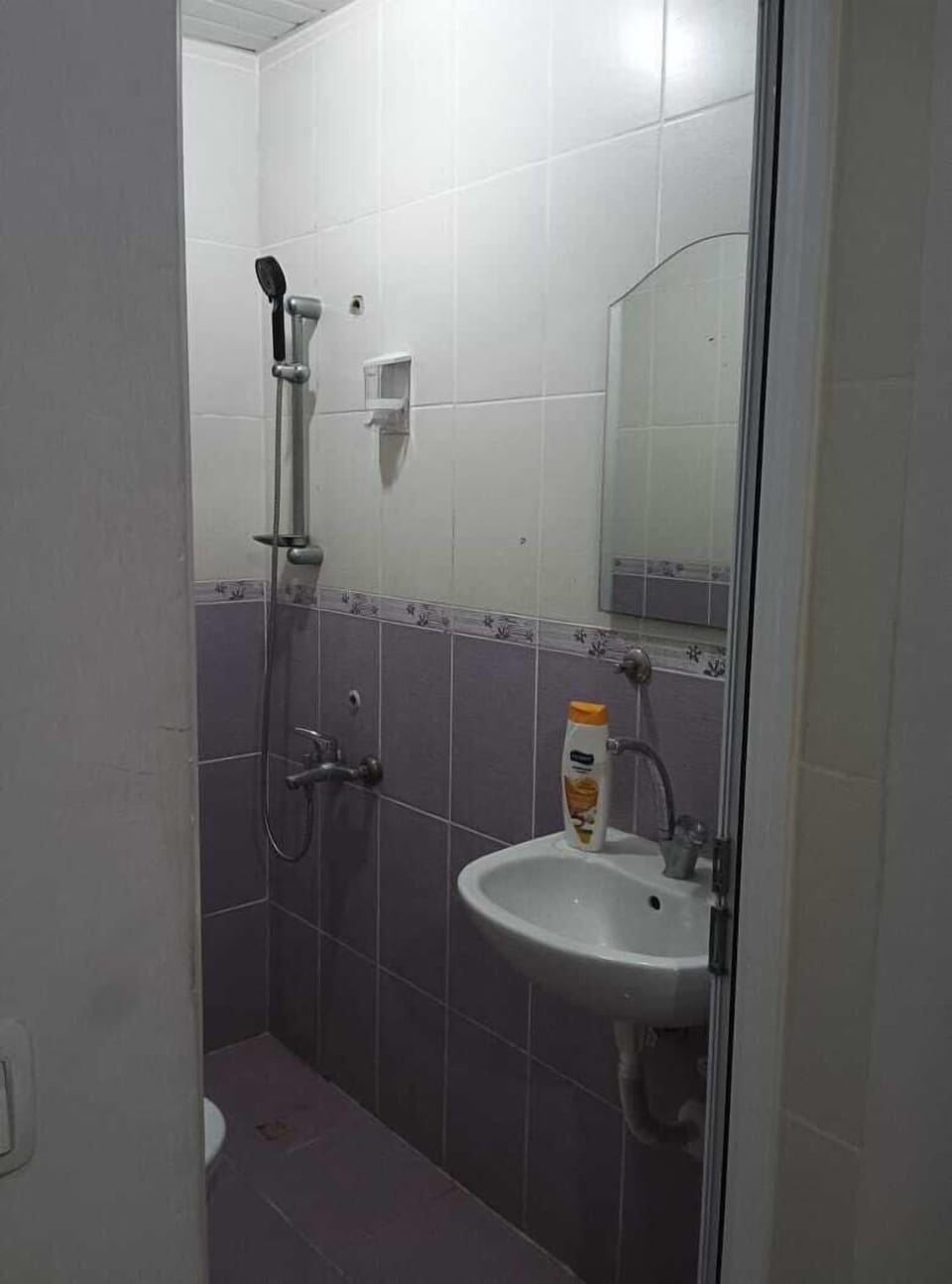 Hair dryer, slippers, towels, soap