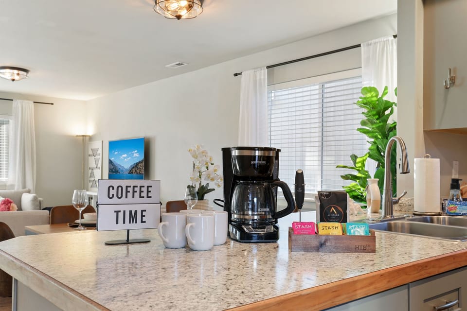12-cup drip coffee maker, ground coffee, tea and milk frother provided