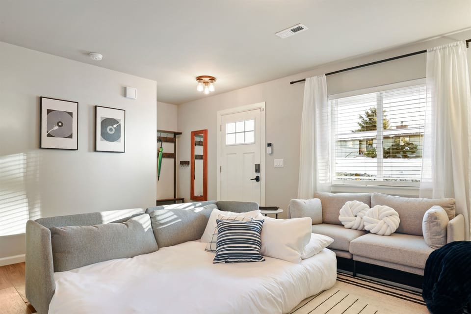 Main floor pull-out couch - approx. queen sized with sheets, pillows and blankets provided