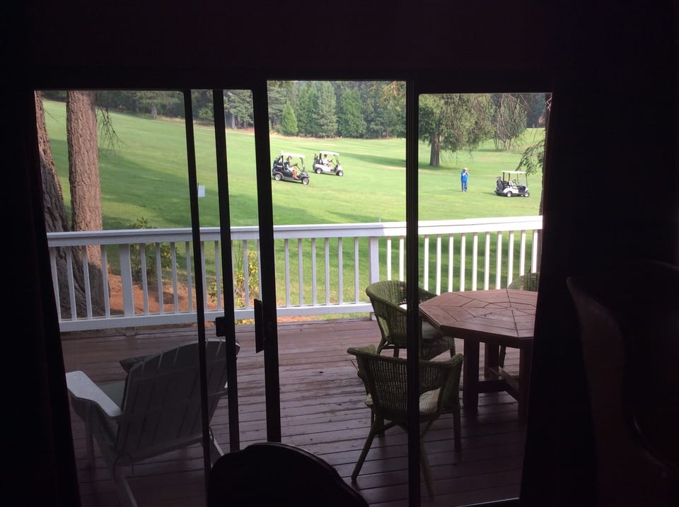 View out to back deck and golf course.