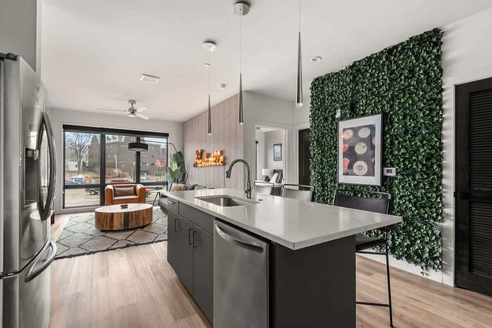 The sleek island doubles as a prep space and a dining area for your group.