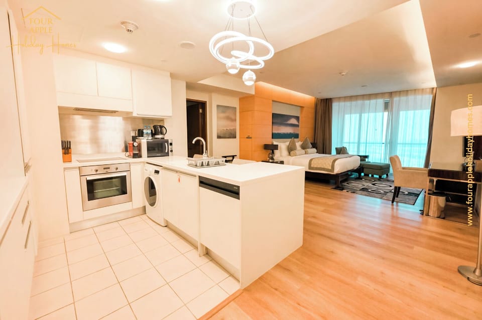 Luxury Studio, Balcony, City View | Private kitchen | Full-size fridge, microwave, oven, stovetop