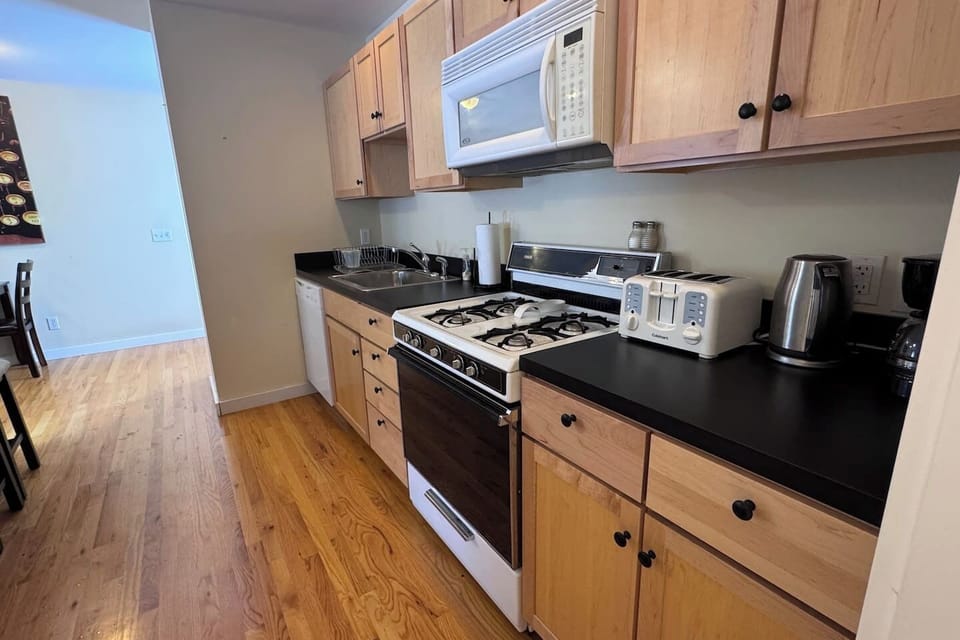 Open-concept apartment with Living room, kitchen, and dining area