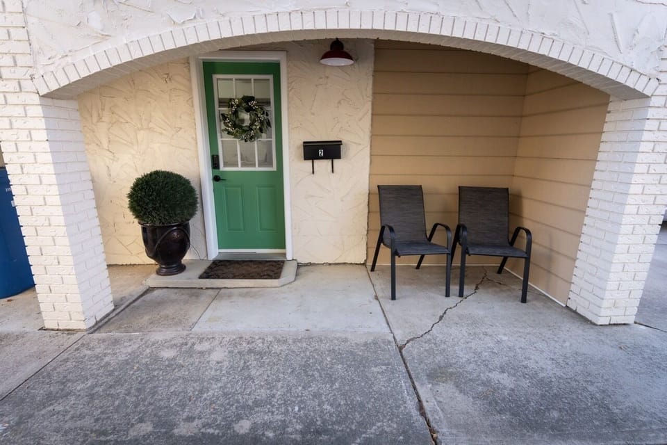 Private covered porch with seating for 2