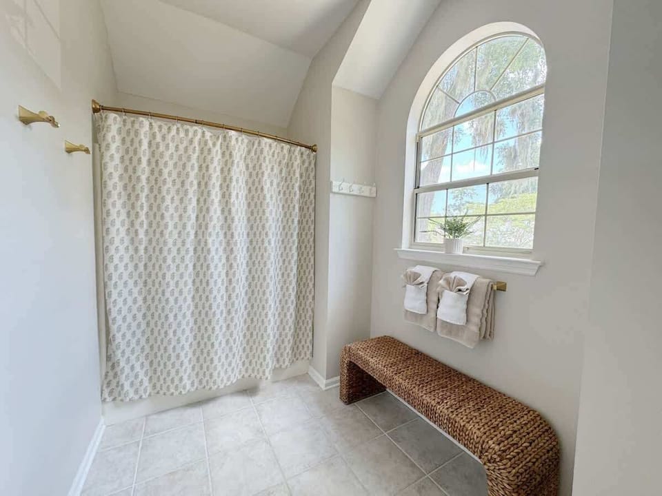Clean lines and bright surfaces create a serene space. Enjoy a long soak here after a day in the sun!
