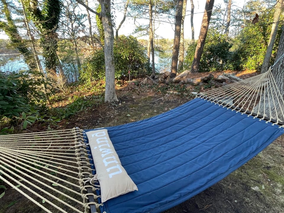 Relax on the hammock with views of Buck's Pond.