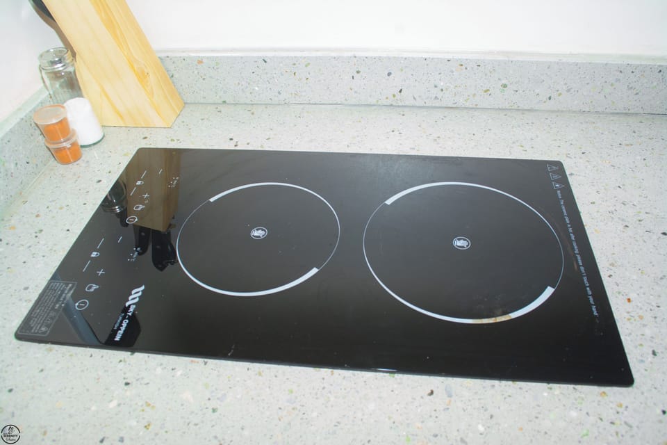 Apartment | Private kitchen | Mini-fridge, microwave, stovetop, cookware/dishes/utensils