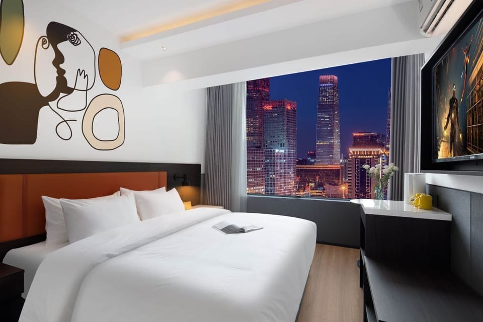 Basic Double Room, City View | Down comforters, laptop workspace, blackout drapes, soundproofing