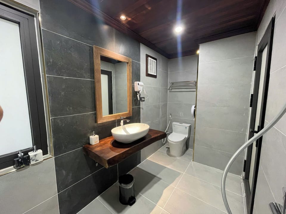 Family Twin Room, Pool View | Bathroom | Shower, hair dryer, towels, soap