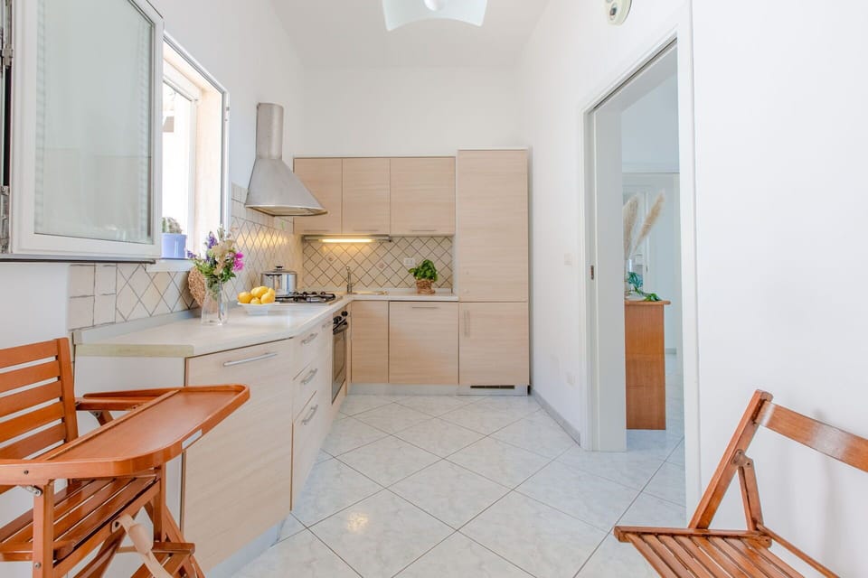 Furniture, Flooring, Interior Design, Wood, Floor, Countertop, Kitchen Appliance, Home, Kitchen, Major Appliance