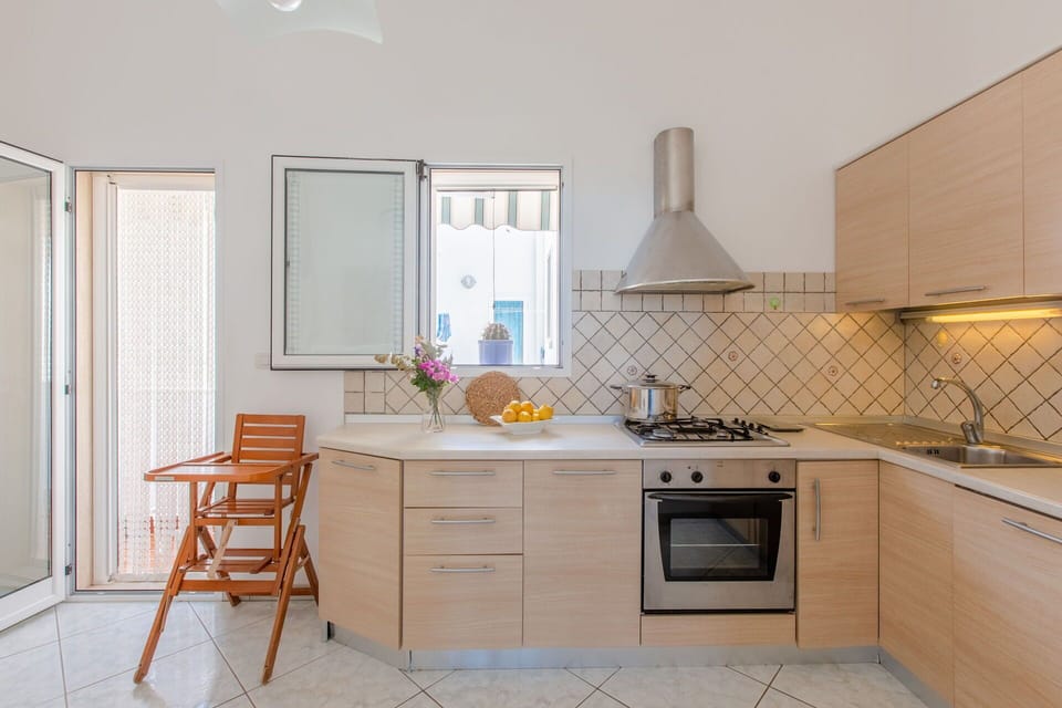 Kitchen, Countertop, Kitchen Appliance, Interior Design, Flooring, Furniture, Major Appliance, Wood, Floor, Cabinetry