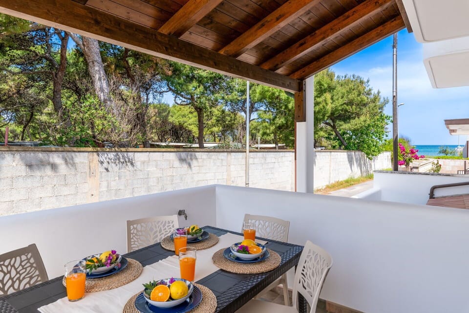 Flooring, Floor, Shade, Chair, Tile, Houseplant, Wood Stain, Kitchen & Dining Room Table, Outdoor Furniture, Hotel