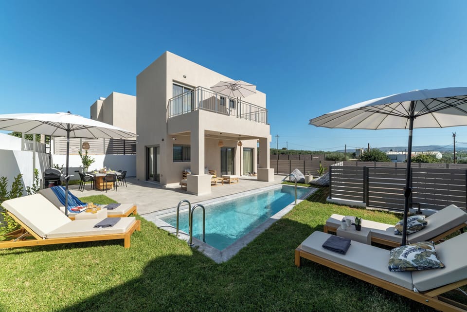 KS Omega Villa - outdoor space with swimming pool, sun beds and BBQ facilities