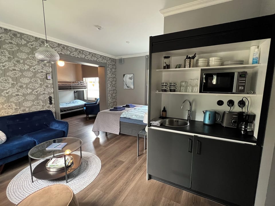 Deluxe Quadruple Room, City View | Individually decorated, individually furnished, blackout drapes
