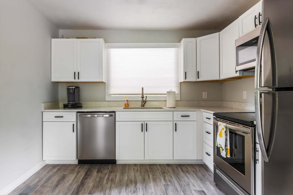 Seamlessly connects the living , dining, and kitchen areas, creating  a welcoming atmosphere