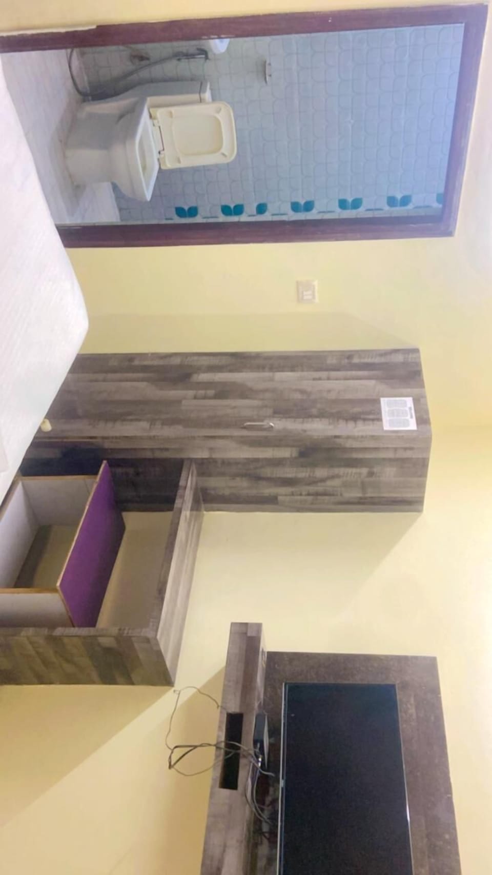 Basic Double Room, Balcony, City View | Living room | TV