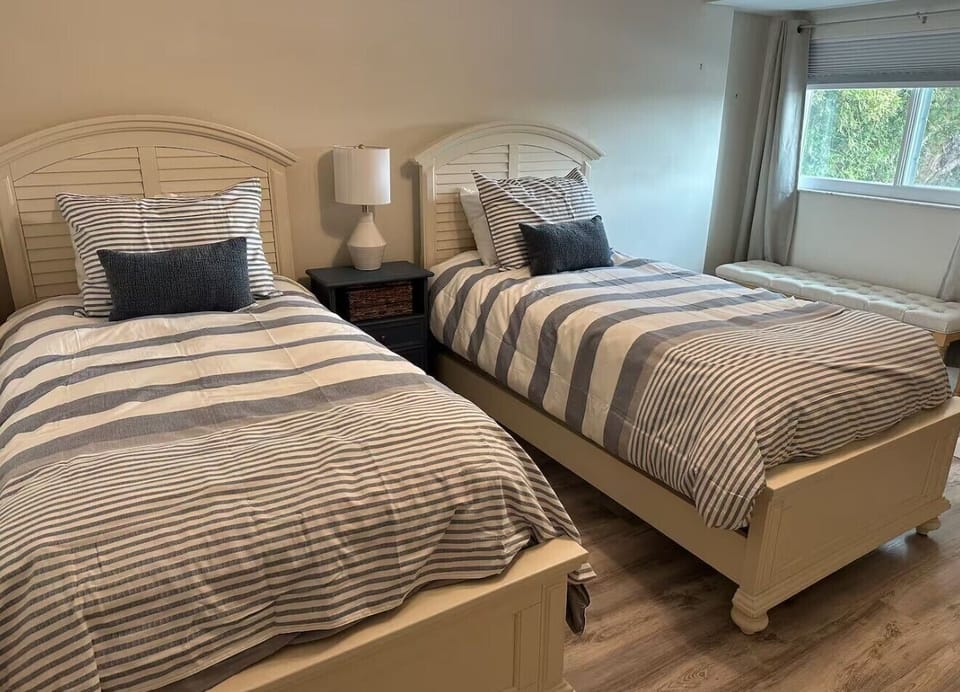 Guest room with two twin beds. 