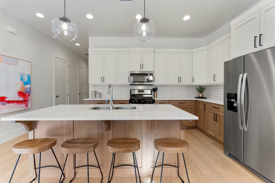 Townhome, 4 Bedrooms | Private kitchen | Coffee/tea maker, fridge, oven, toaster