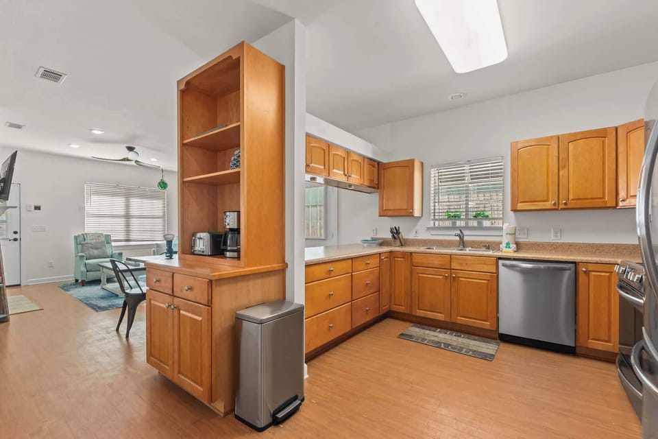 Our kitchen is fully stocked with dishes, silverware, utensils, cookware, bakeware, and a variety of small appliances.