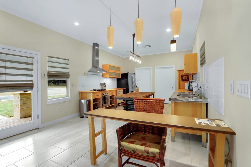 The kitchen is located on the other side of the entrance