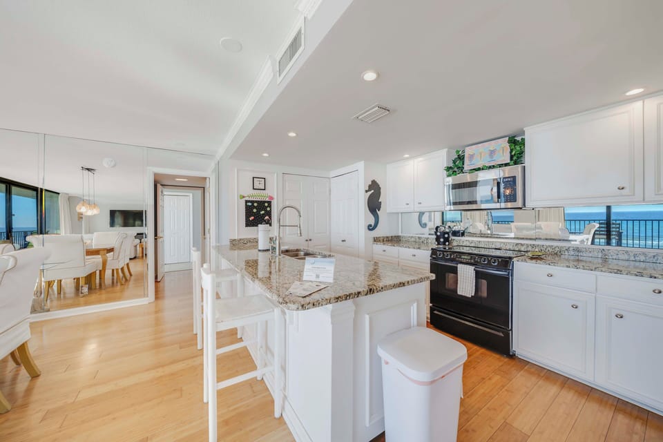 The fully equipped kitchen features granite countertops, mostly all stainless-steel appliances, and has everything you need to prepare meals for family & friends.