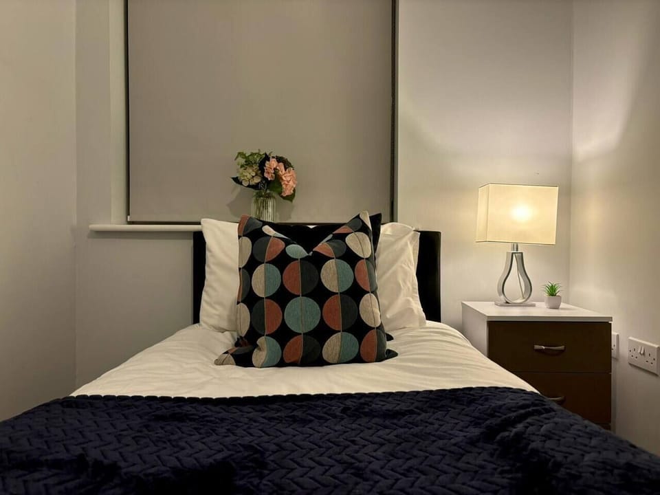 Your Cozy Getaway Awaits, Relax and Sleep Soundly in this Bedroom. Book Your Stay Now! (29)