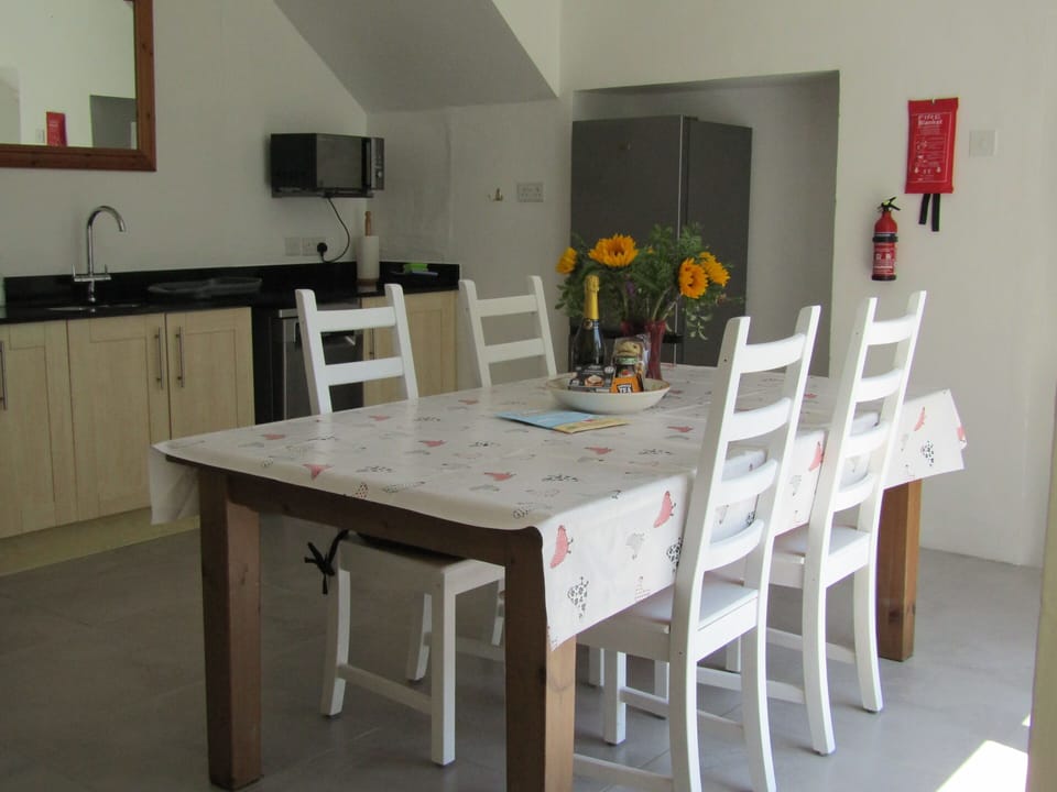 Well equipped kitchen with dishwasher. Patio doors leading to the sunny garden.