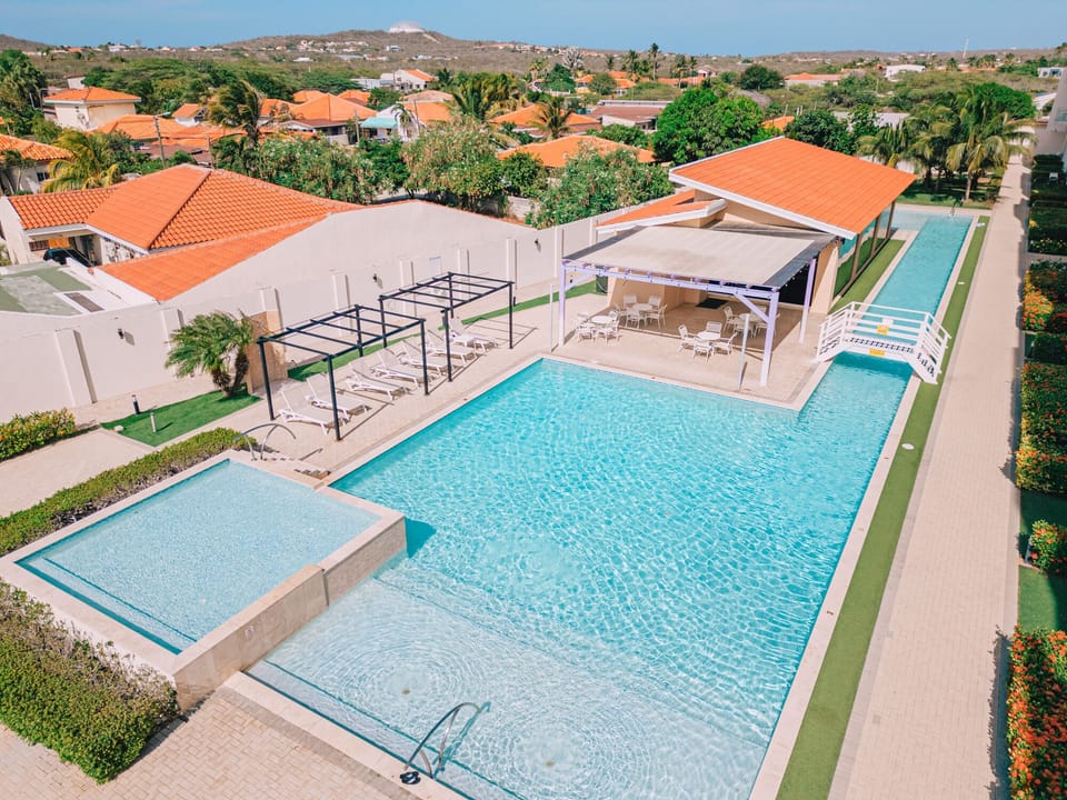 Escape to this sparkling pool oasis, perfect for a refreshing swim or soaking up the sun