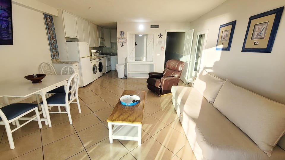 Condo, 1 King Bed with Sofa bed (The Summit 302) | Living area | TV