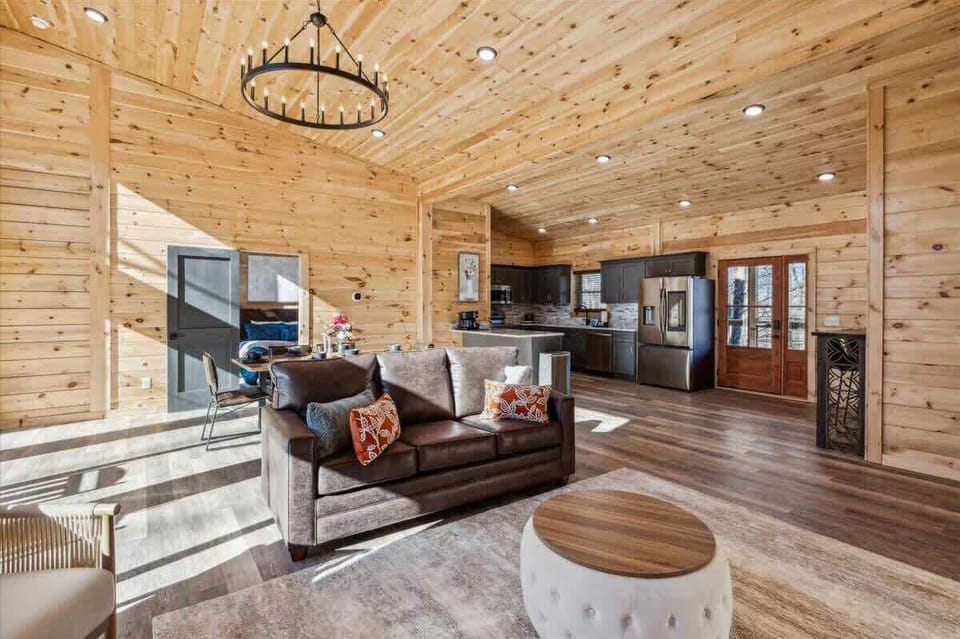 Living Room: Abundant light dances on wood finishes, accent pillows add charm to your mountain retreat!