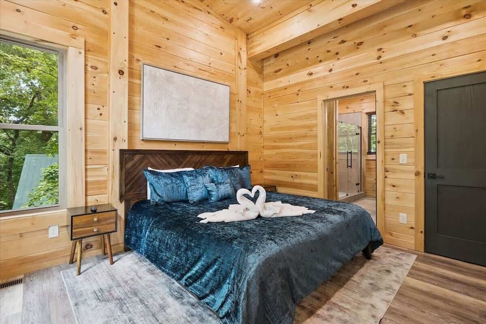 Experience tranquility in this beautifully designed room with lush green views!