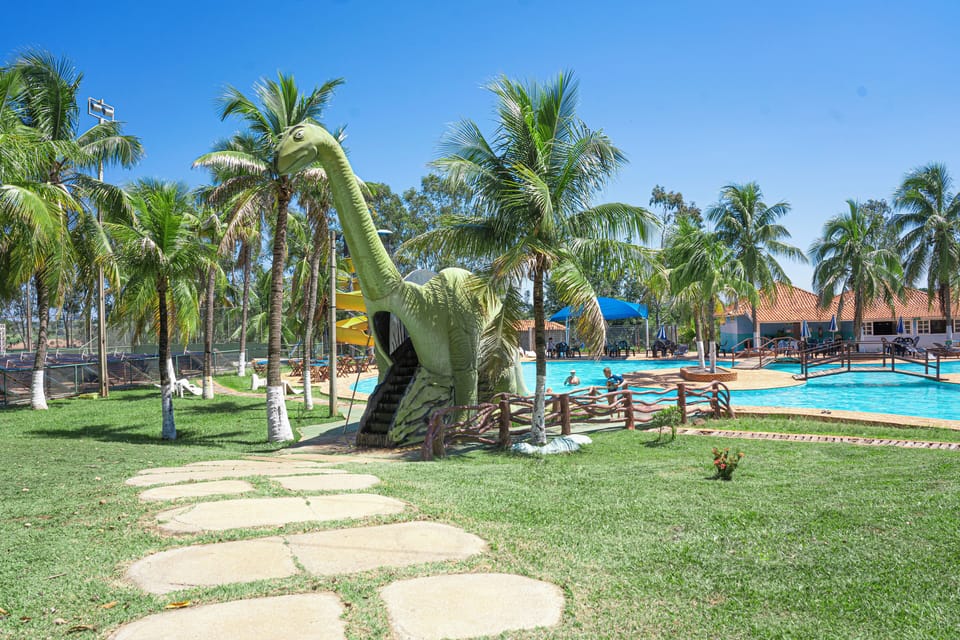 Indoor pool, 7 outdoor pools, open 10:00 AM to 8:00 PM, pool umbrellas