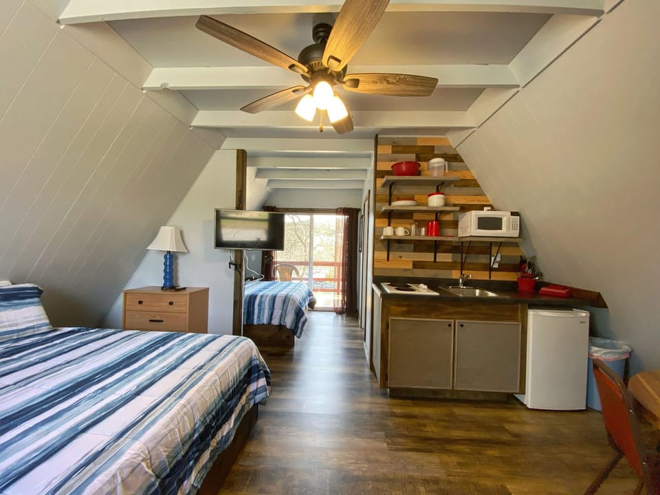 Inside cabin with two queen beds