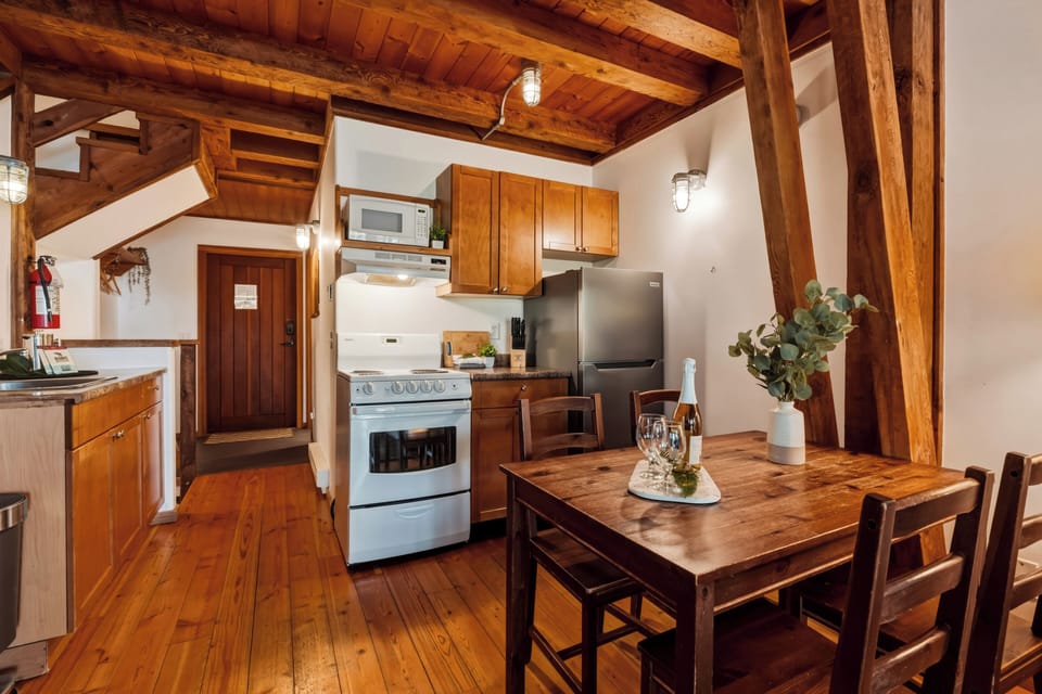 Full kitchen featuring a dining corner for morning coffee.